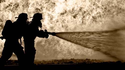 Firefighters fight fire