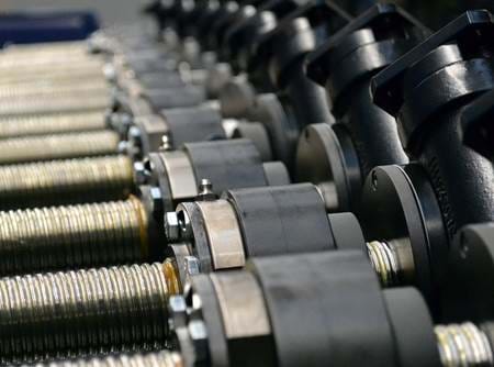Several worm gear screw jacks in line